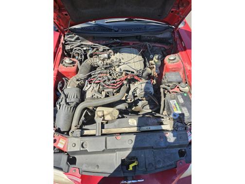 Red 1998 Ford Mustang Base