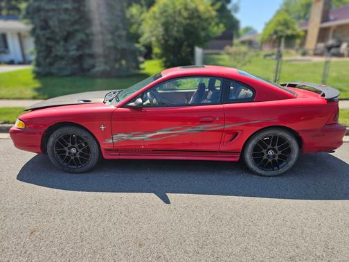 Red 1998 Ford Mustang Base