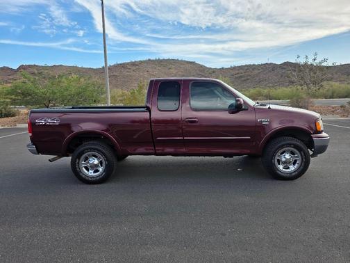 Red 1999 Ford F-150 XLT SuperCab