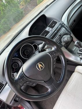 Red 2010 Acura TL Technology