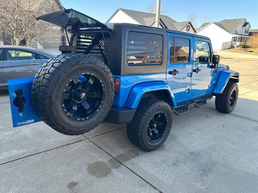 Blue 2015 Jeep Wrangler Unlimited Sahara