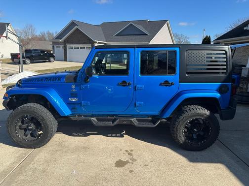 Blue 2015 Jeep Wrangler Unlimited Sahara