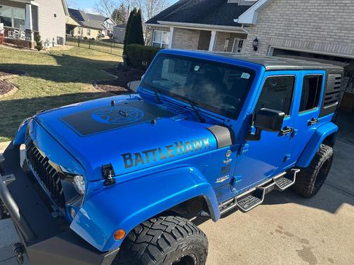 Blue 2015 Jeep Wrangler Unlimited Sahara