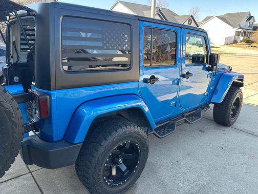 Blue 2015 Jeep Wrangler Unlimited Sahara