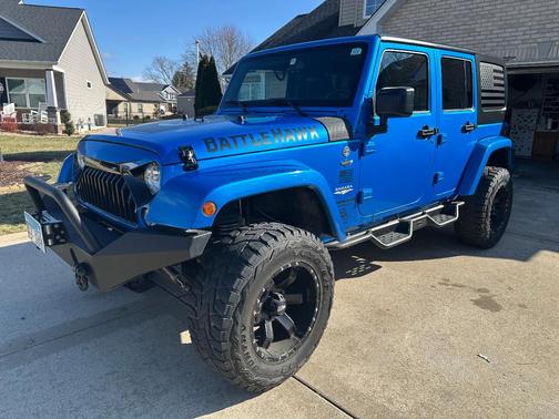 Blue 2015 Jeep Wrangler Unlimited Sahara