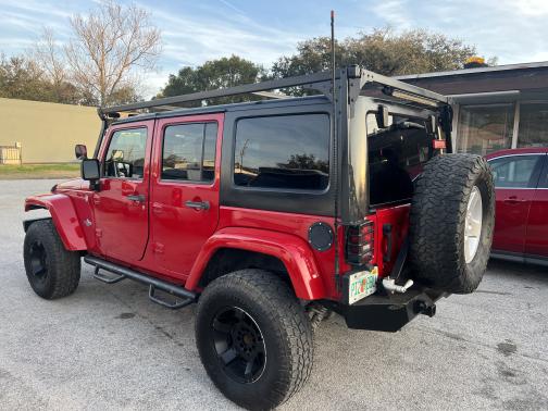Photo 2 of 14 of 2014 Jeep Wrangler Unlimited Freedom Edition