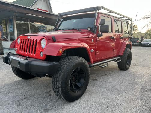 Photo 3 of 14 of 2014 Jeep Wrangler Unlimited Freedom Edition