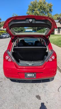 Red 2008 Nissan Versa SL