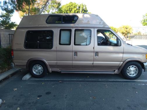 Brown 1997 Ford E150 Base