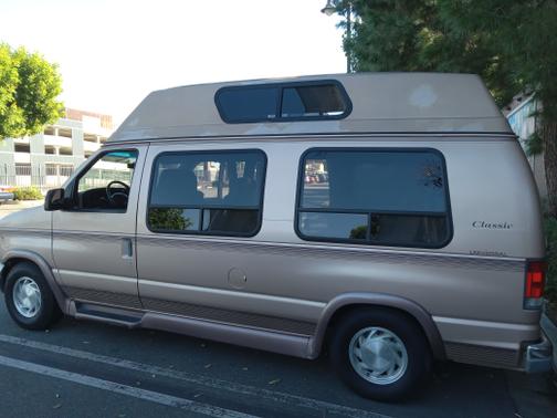 Brown 1997 Ford E150 Base