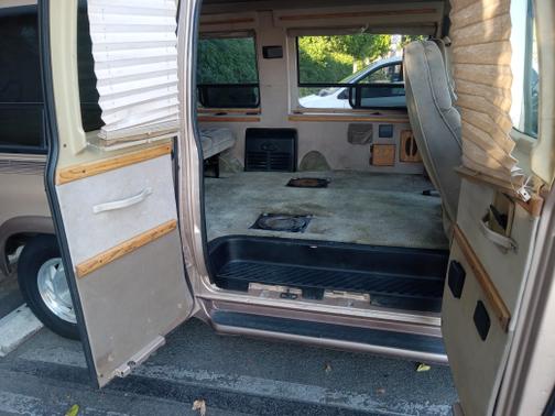 Brown 1997 Ford E150 Base