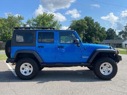 Blue 2012 Jeep Wrangler Unlimited Sport