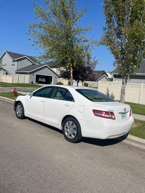 White 2010 Toyota Camry LE