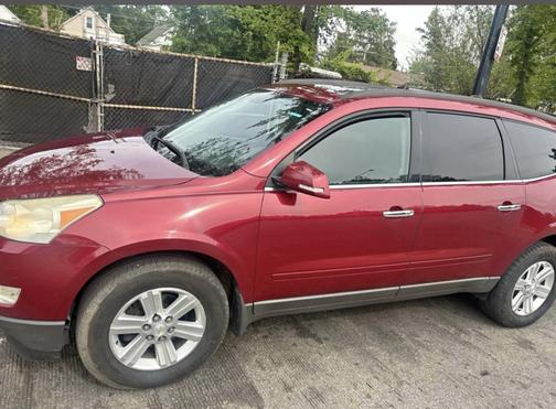 Red 2010 Chevrolet Traverse LT