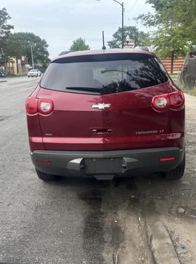 Red 2010 Chevrolet Traverse LT
