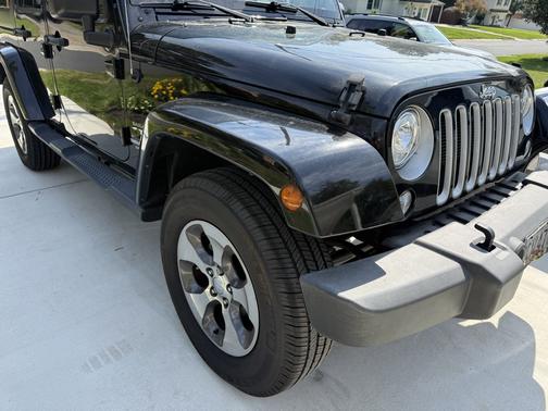 Black 2017 Jeep Wrangler Unlimited Sahara