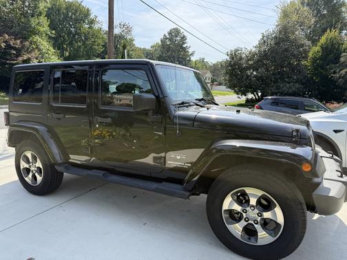 Black 2017 Jeep Wrangler Unlimited Sahara