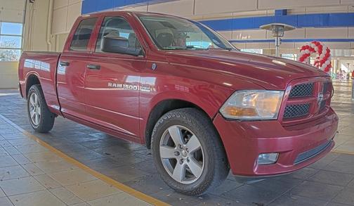 Red 2012 RAM 1500 Sport