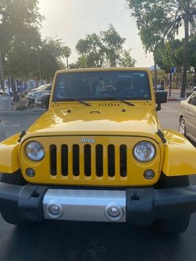 Photo 2 of 5 of 2015 Jeep Wrangler Sahara