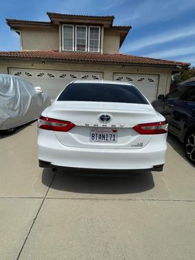 White 2020 Toyota Camry Hybrid LE