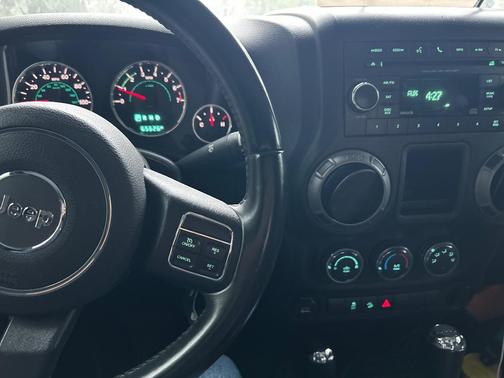Blue 2015 Jeep Wrangler Willys Wheeler