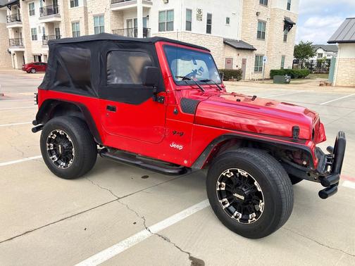 Red 2000 Jeep Wrangler SE