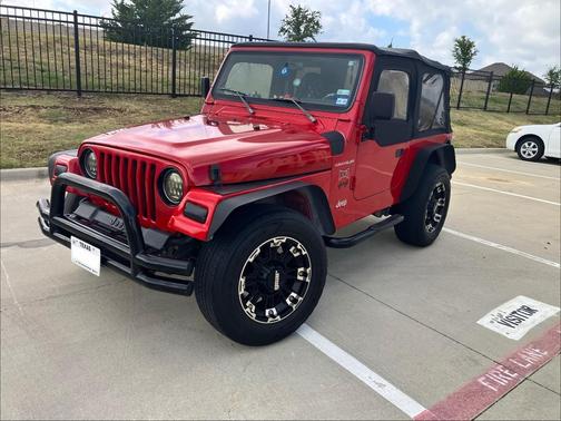Red 2000 Jeep Wrangler SE