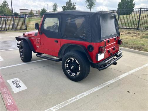 Red 2000 Jeep Wrangler SE