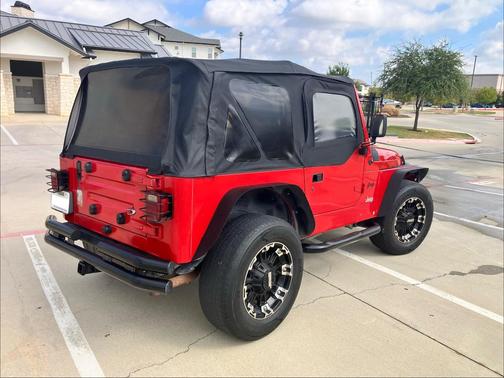 Red 2000 Jeep Wrangler SE