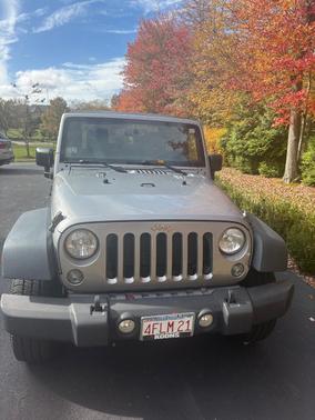 Silver 2015 Jeep Wrangler Sport