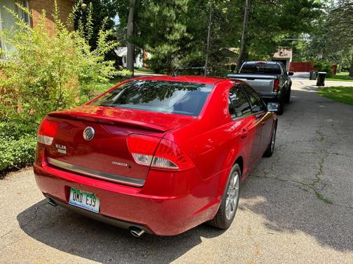 Red 2011 Mercury Milan Premier