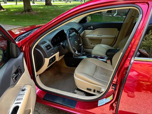 Red 2011 Mercury Milan Premier