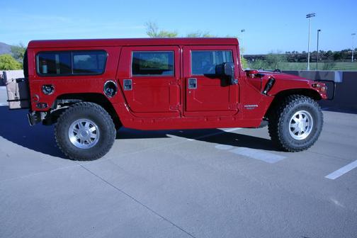 Red 1998 AM General Hummer Wagon