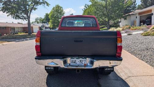 Red 2003 Toyota Tacoma Xtracab