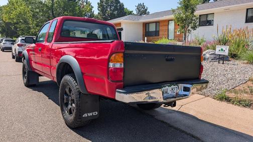 Red 2003 Toyota Tacoma Xtracab