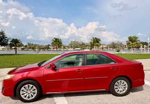 Red 2013 Toyota Camry LE