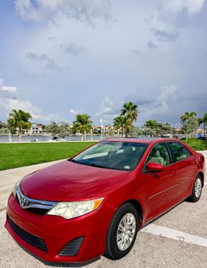 Red 2013 Toyota Camry LE