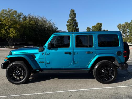 Blue 2024 Jeep Wrangler 4xe Sahara