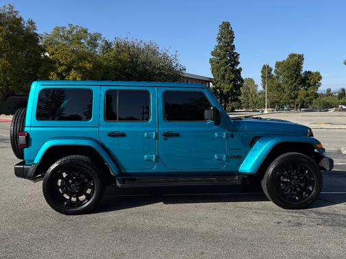 Blue 2024 Jeep Wrangler 4xe Sahara