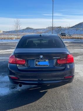 Blue 2014 BMW 320 i