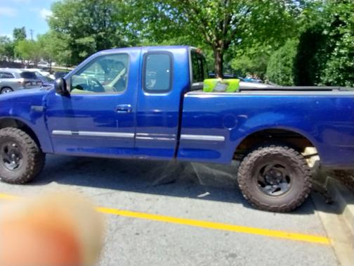 Blue 1997 Ford F-150 XLT SuperCab