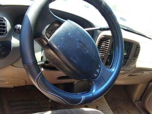 Blue 1997 Ford F-150 XLT SuperCab