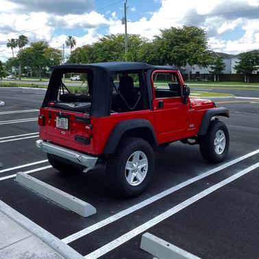 Red 2006 Jeep Wrangler X