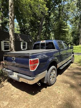 Blue 2010 Ford F-150 XLT SuperCrew