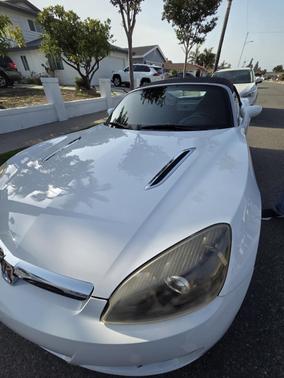 White 2007 Saturn Sky Red Line