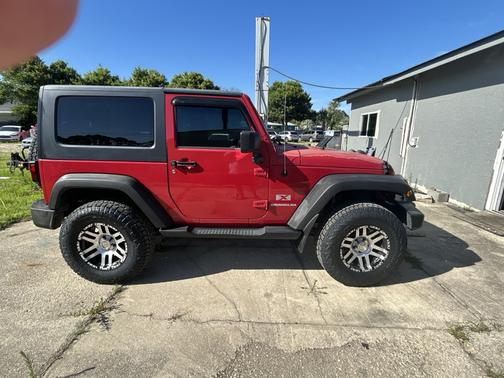 Red 2009 Jeep Wrangler X