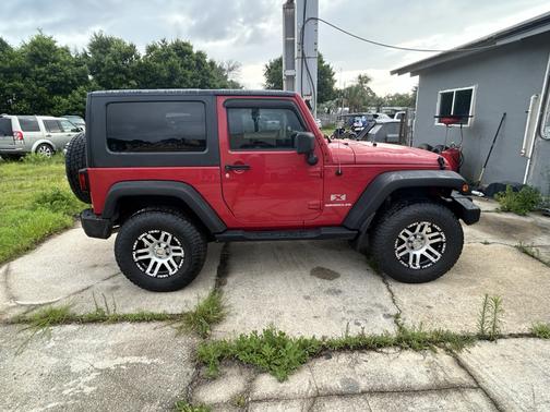 Red 2009 Jeep Wrangler X