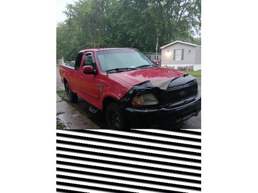 Red 2001 Ford F-150 XLT SuperCab