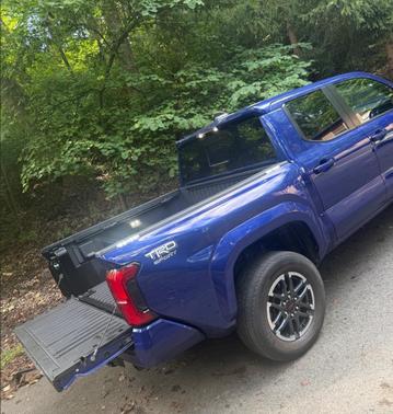 Blue 2025 Toyota Tacoma Hybrid TRD Sport