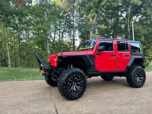 Red 2014 Jeep Wrangler Unlimited Rubicon